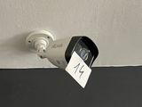 an image of a security camera mounted on a wall