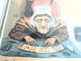 une photo d'une photo représentant une vieille femme en train de jouer aux cartes