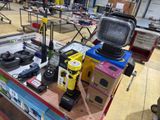 a table with a lot of tools on it in a warehouse