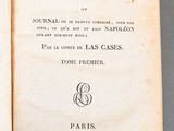 an open book with a picture of a cat on it ' s cover