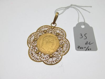 a close up of a gold coin with a price tag on it