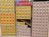several boxes are stacked on top of each other in a room