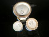 three cups that are sitting on a table