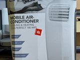 a box of air conditioner sitting on the floor in the garage