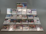 a lot of video games on display on a table
