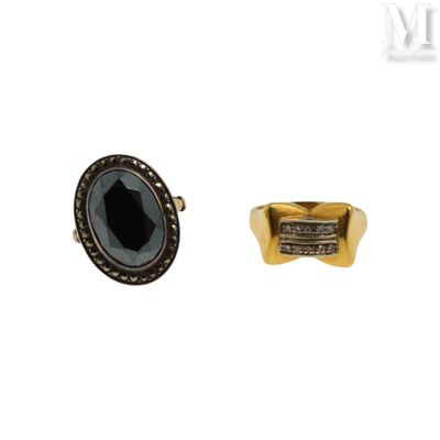 une image représentant une bague et une bague sertie d'une pierre noire