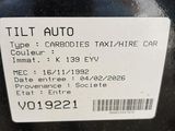 a picture of a car with a sticker on it ' s bumper