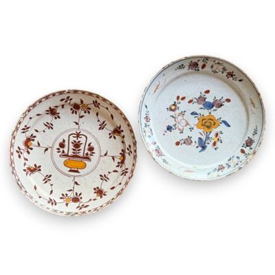 two plates that are sitting side by side on a white surface