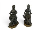 pair of bronze figurines of a woman and a child