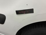a close up of a sticker on the side of a car