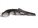 a close up of a gun on a white background