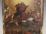 une vieille photo représentant un tableau de Jésus posé sur une table en bois
