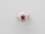 a ruby and diamond cluster ring