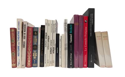 a lot of books that are on a shelf