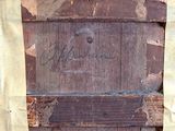 a picture of a piece of wood with writing on it