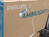 a box of toothbrushes sitting on top of a carton