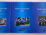 two blue brochures with pictures of a racing car and a photo of a man driving a car