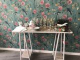 a table that has a bunch of glasses on top of it