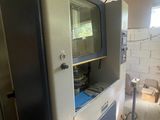 a machine that is sitting inside of a building