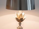 a lamp that is on top of a marble table