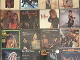 a lot of records that are on the wall