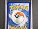 a close up of a pokemon card in a plastic case