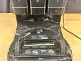 a black machine that is sitting on a wooden table