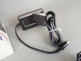 an image of a power cord and a charger on a table