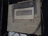 an old electronic device that is on display in a case