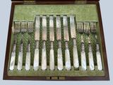 a box with a set of silverware in it