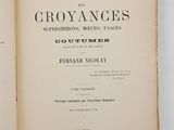 an open book with a black and white title on it