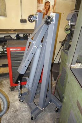 a picture of a workbench in a garage with tools