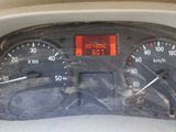 a close up of a car dashboard with a speedometer