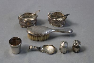 a lot of silver items that are on a table