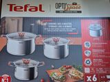 a box with a set of pots and pans on it
