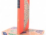 a book that is sitting on top of a book stand