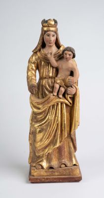statue of a woman holding a child in her arms