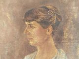 portrait of a woman in a white dress with a tiable