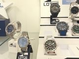 a lot of watches on display in a store