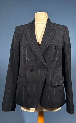 an image of a suit on a mannequin mannequin stand
