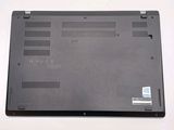 a black laptop that is sitting on a white table