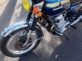 a motorcycle that is parked on the side of the road