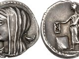une pièce d'argent sur laquelle figurent une femme et un homme