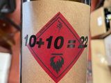 a bottle of wine that is sitting on a table
