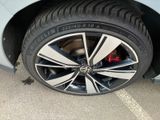 a close up of a tire on the side of a car