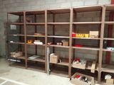many boxes and boxes on the shelves in the garage