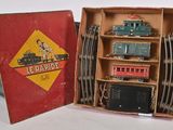 a box with a train set inside of it