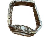 a metal bracelet with a watch on it on a white background