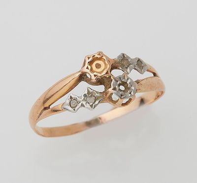 an 18k gold and diamond ring