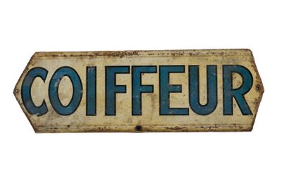 a sign that says coiffeur on a white background